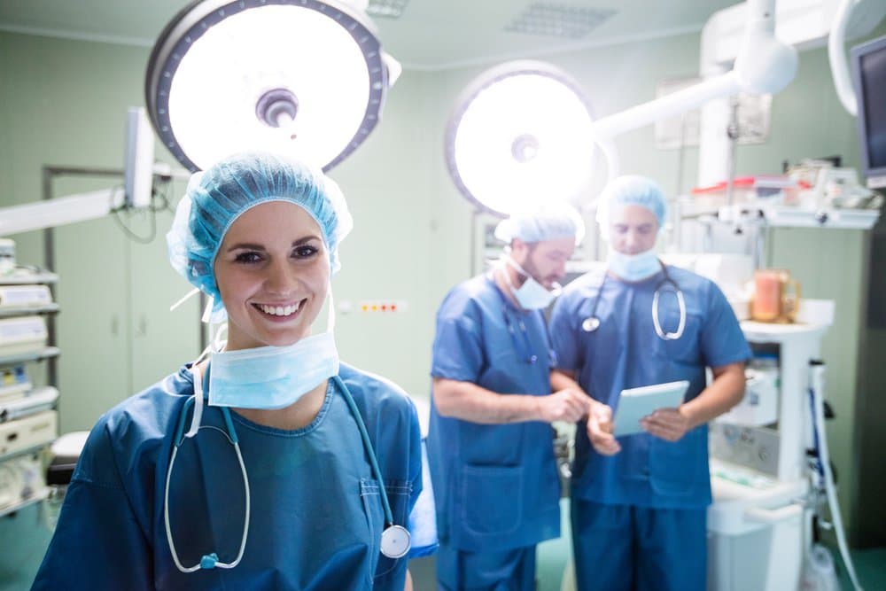 Surgeons smiling in theatre