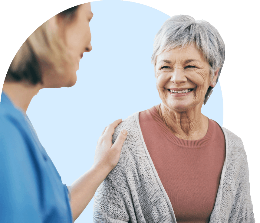 Caring hand placed on older woman's shoulder